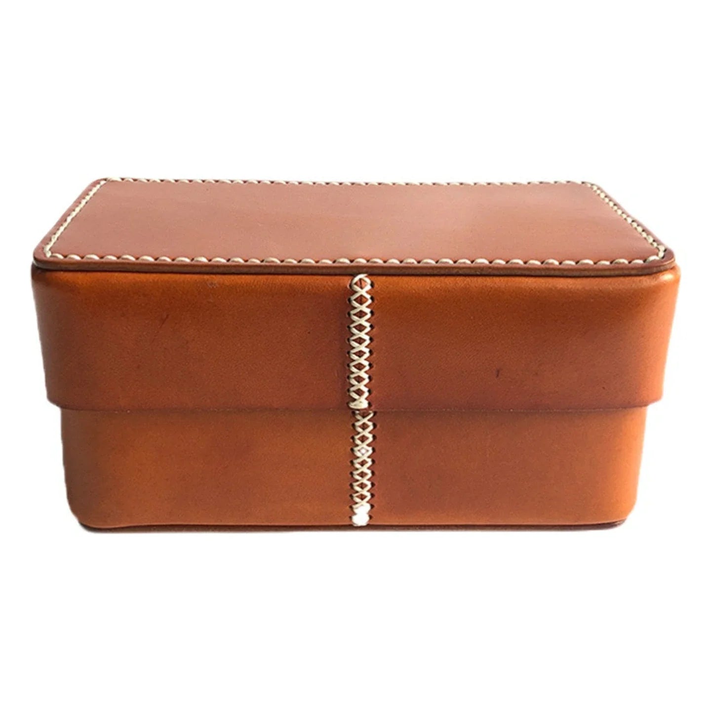 Brown leather keepsake box on a clean neutral background