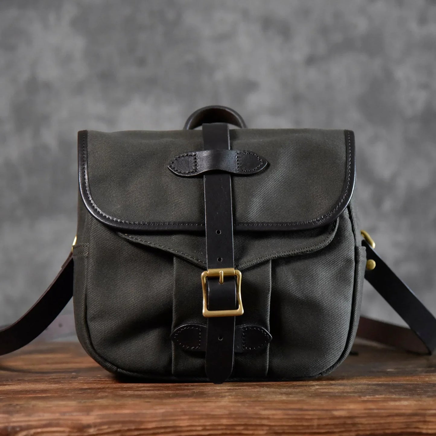 Olive green waxed canvas messenger bag full front view