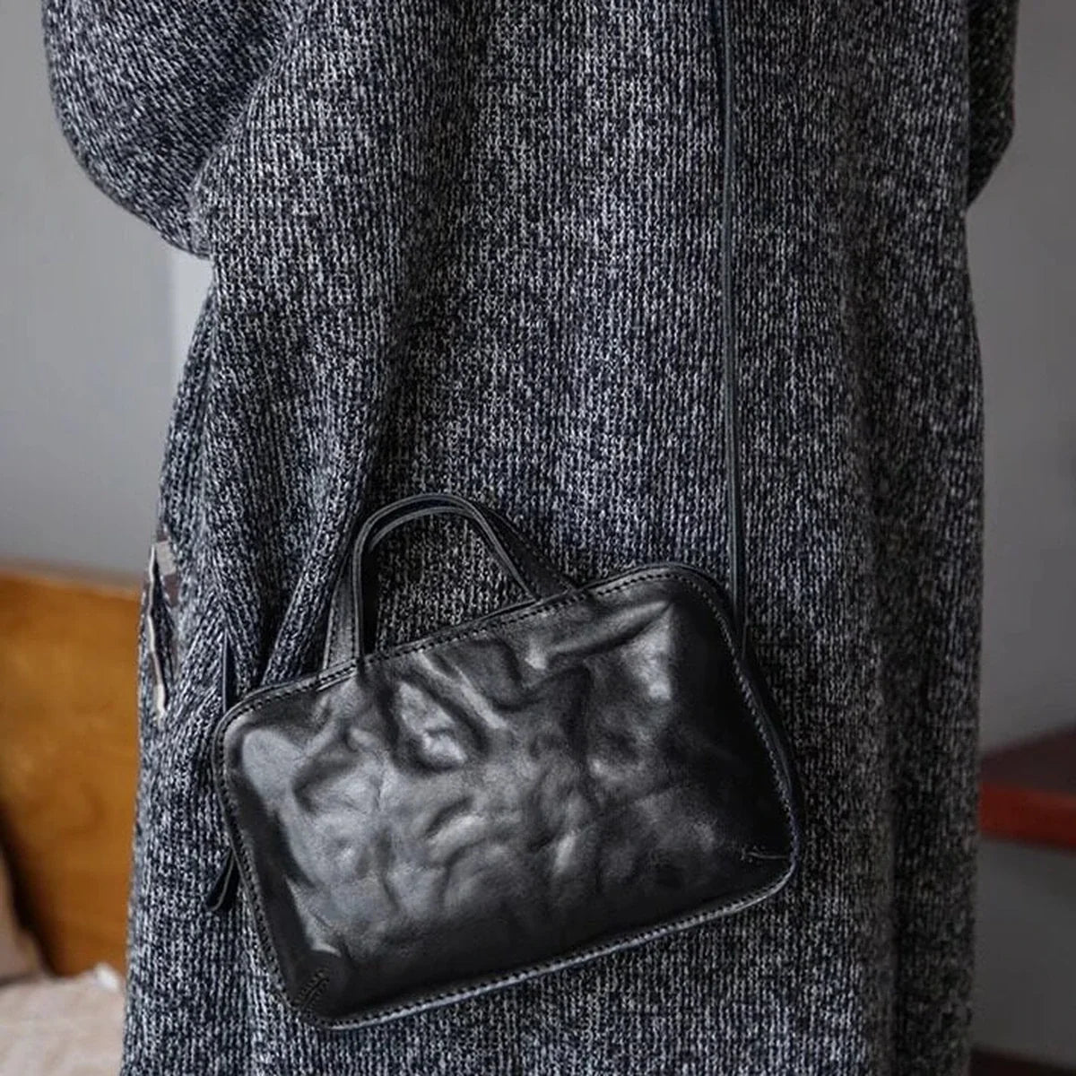 Black crinkled cowhide mini bag styled crossbody