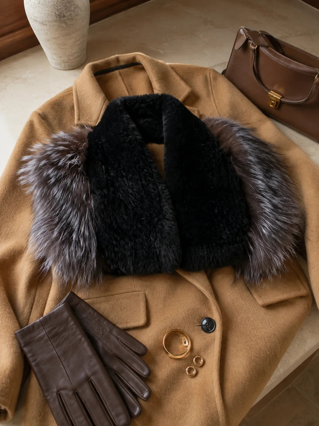 Black and silver gray rabbit and fox fur wrap styled with a camel coat and leather gloves