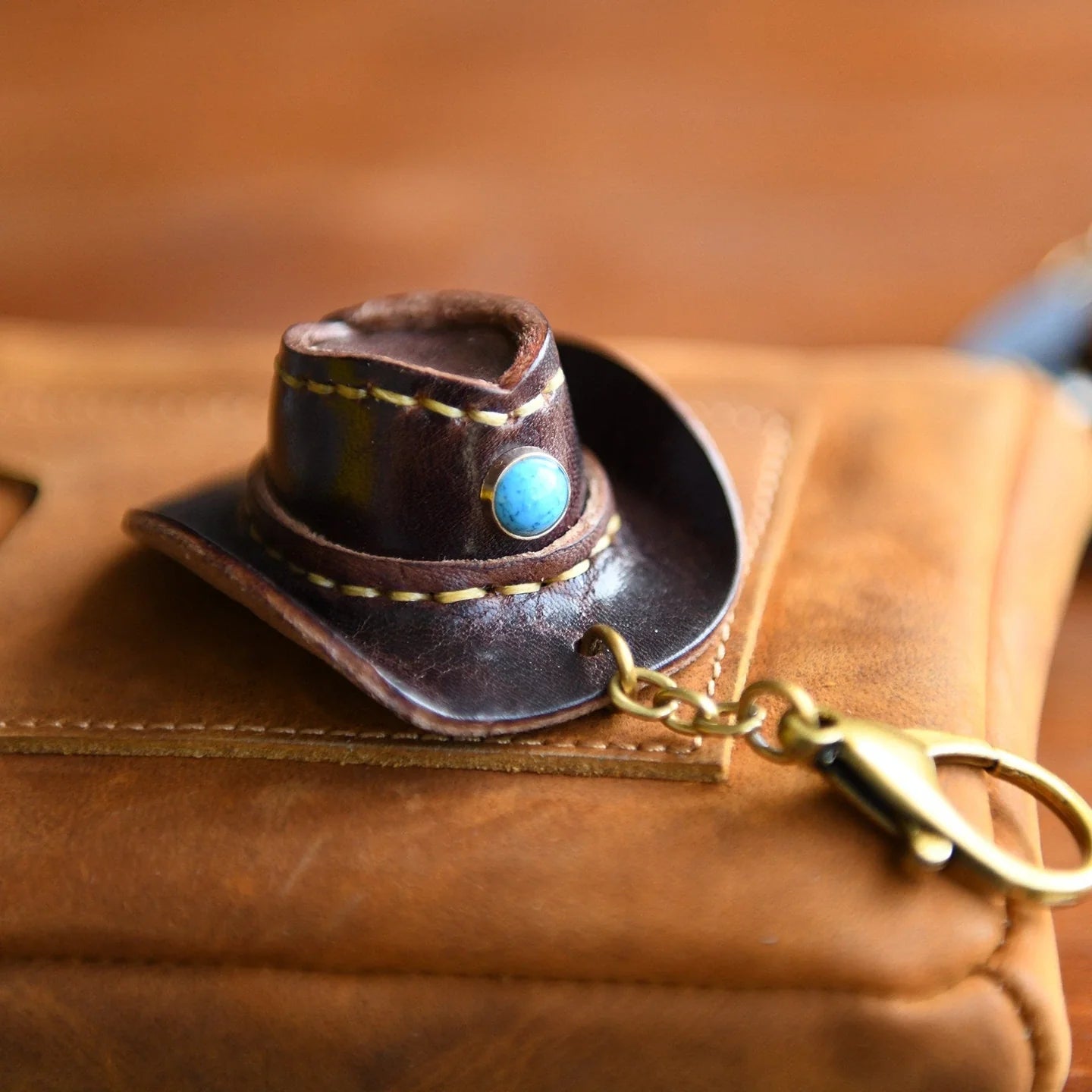 Dark Coffee cowhide mini cowboy hat keychain, styled product view