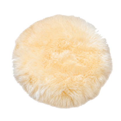 Cream genuine long-wool sheepskin round chair pad on transparent background