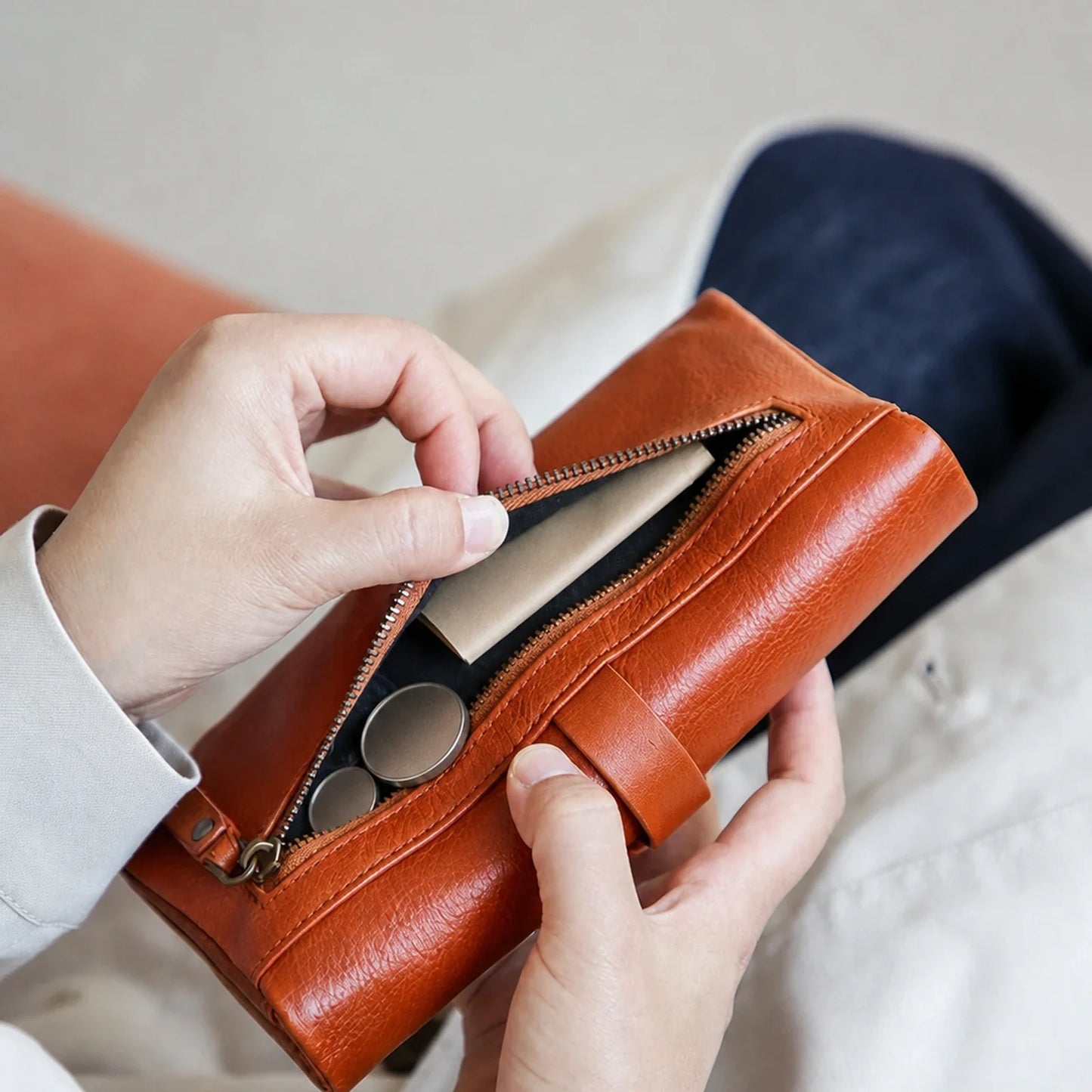 Cognac leather wallet zip coin pocket construction detail
