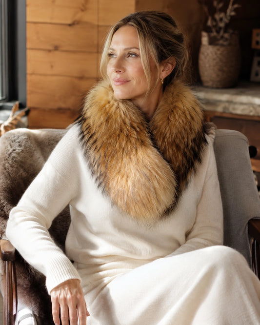 Adult woman wearing a Natural Golden Tan genuine fox fur cape scarf indoors