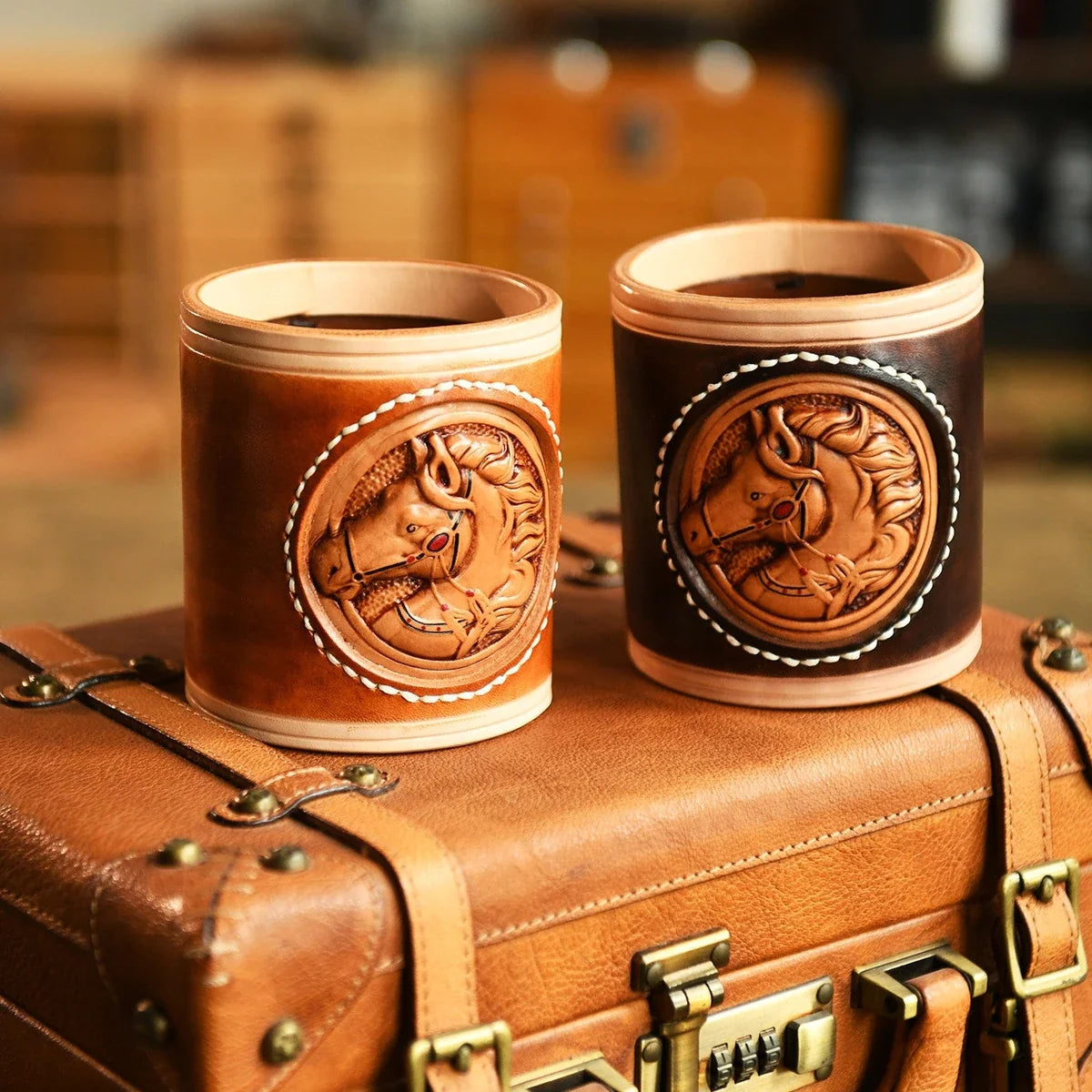 Coffee and brown leather horse pen holders in a study setting