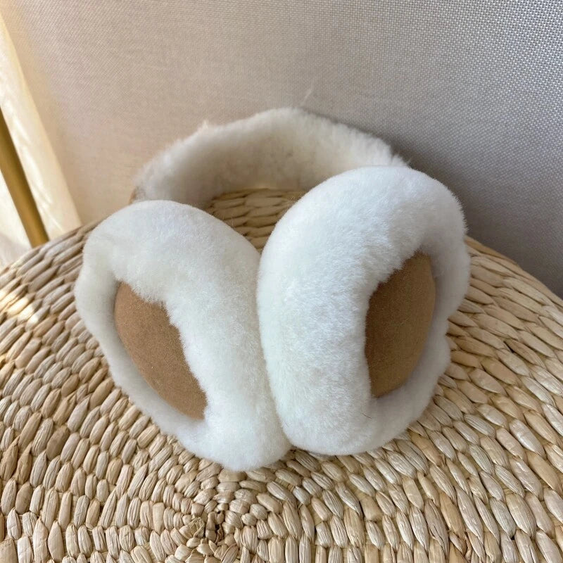 Ivory and camel sheepskin earmuffs showing natural wool and suede texture
