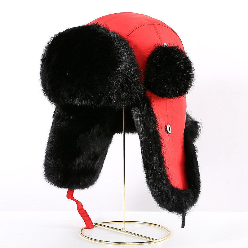 Unisex red trapper hat with black rabbit fur trim