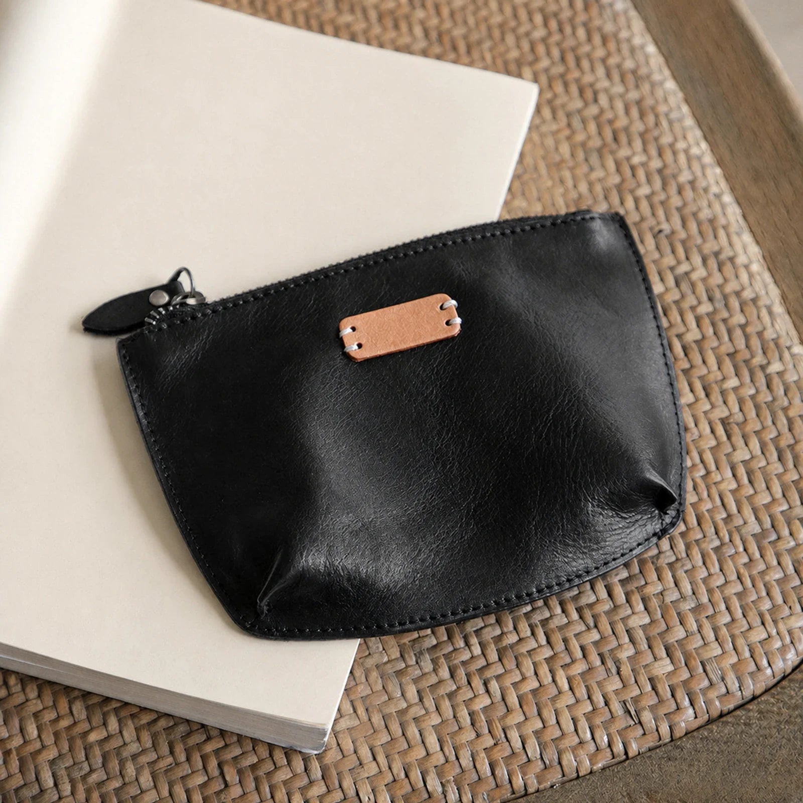 Black vegetable-tanned top-grain leather cosmetic pouch