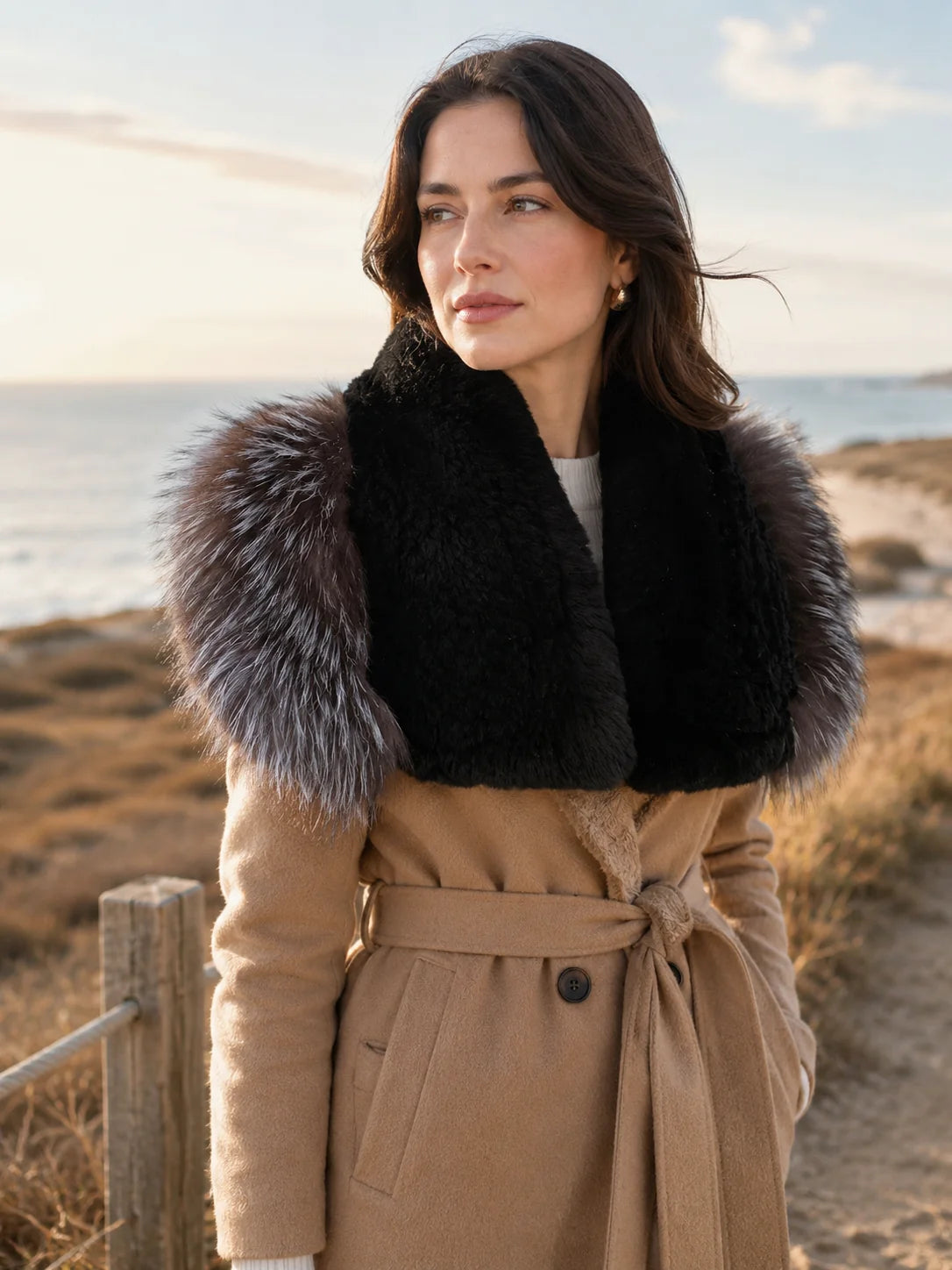 Woman wearing a black and silver gray rabbit and fox fur wrap outdoors in winter