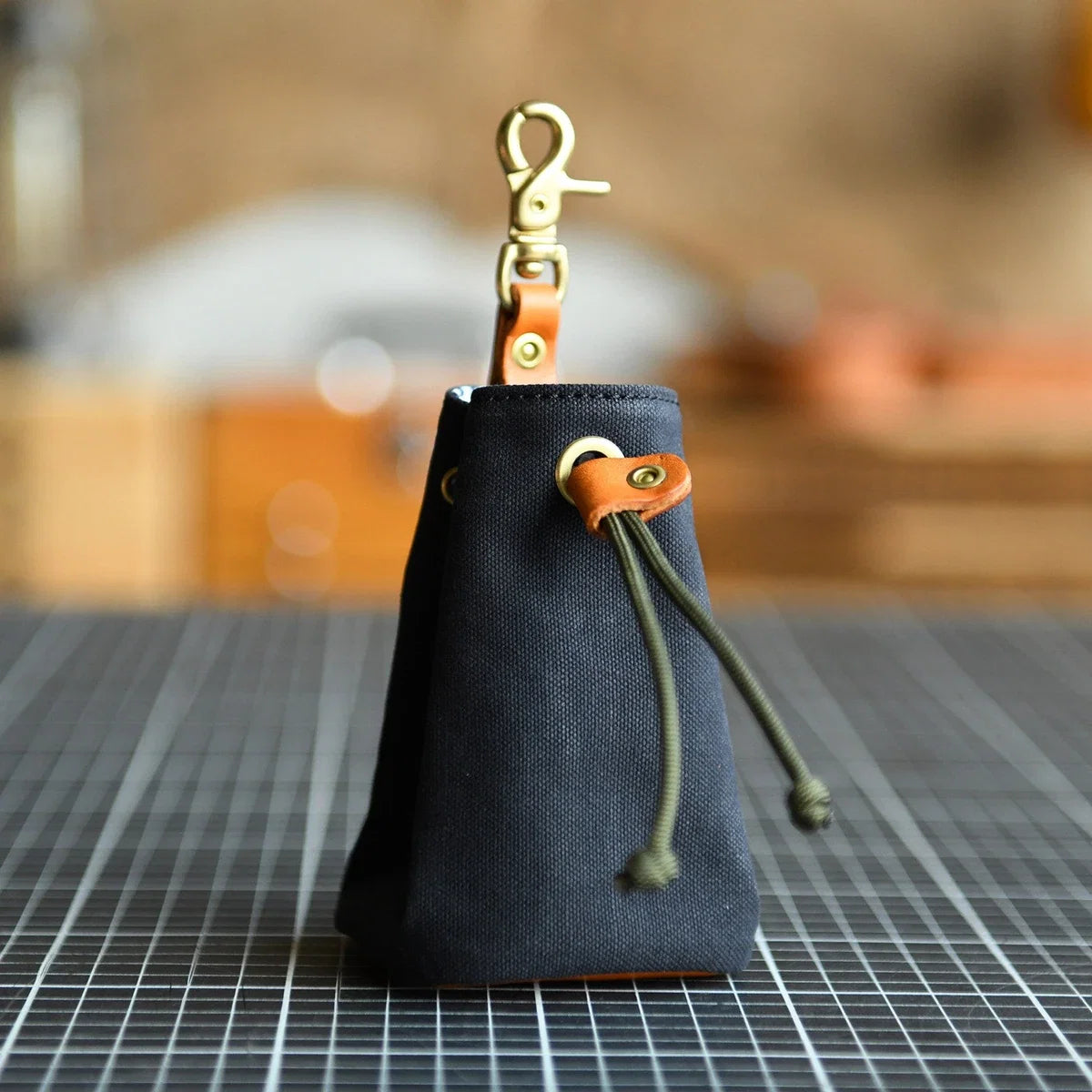 Black canvas and leather drawstring storage pouch