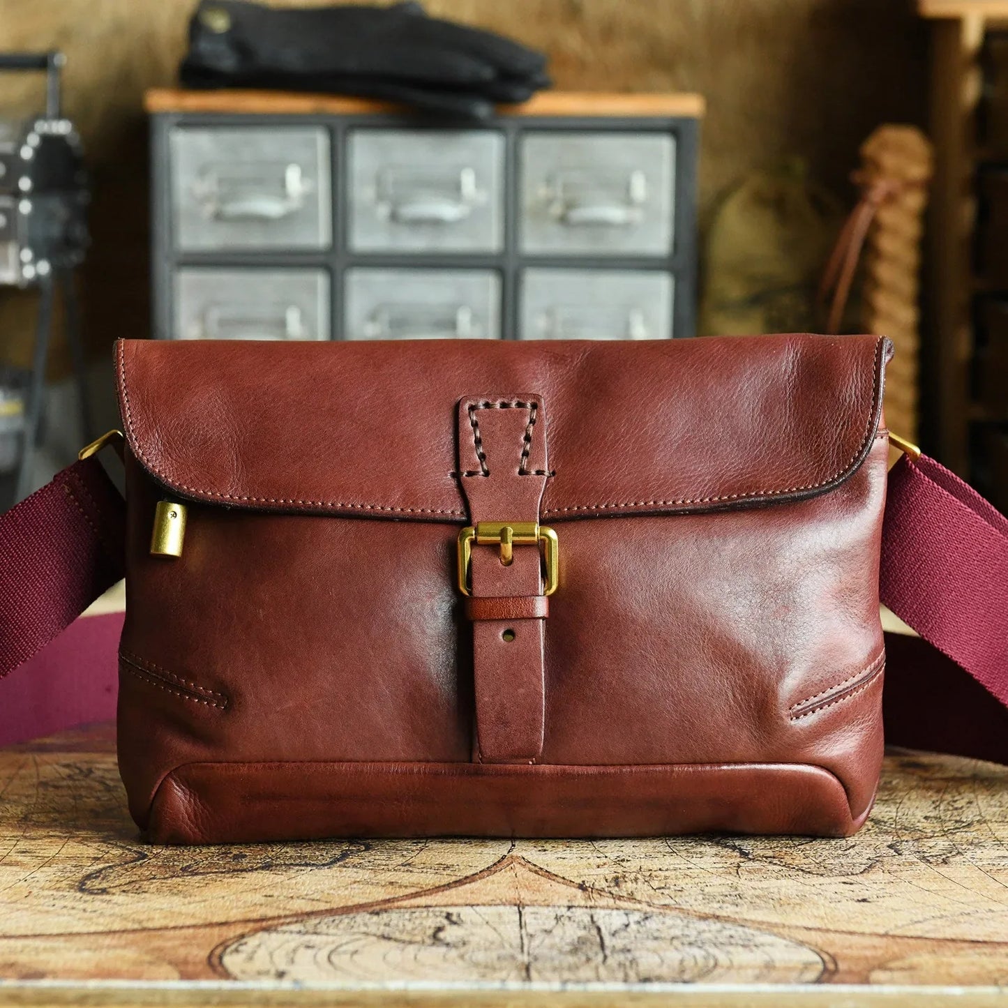 Burgundy vegetable-tanned cowhide crossbody bag front view