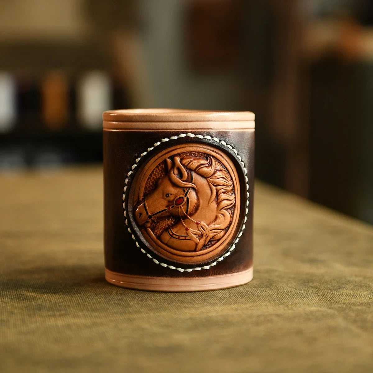 Coffee-colored hand-carved leather horse pen holder