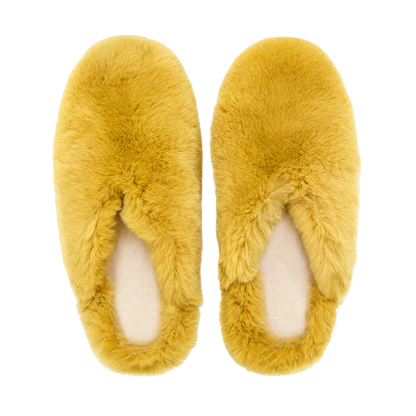 Mustard Gold genuine rabbit fur closed-toe house slippers on a transparent background