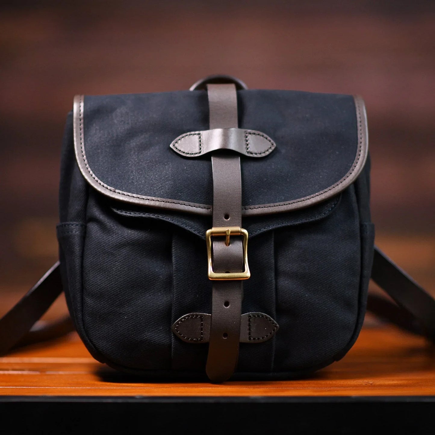 Slate blue waxed canvas and leather messenger bag full front view