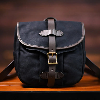 Slate blue waxed canvas and leather messenger bag full front view