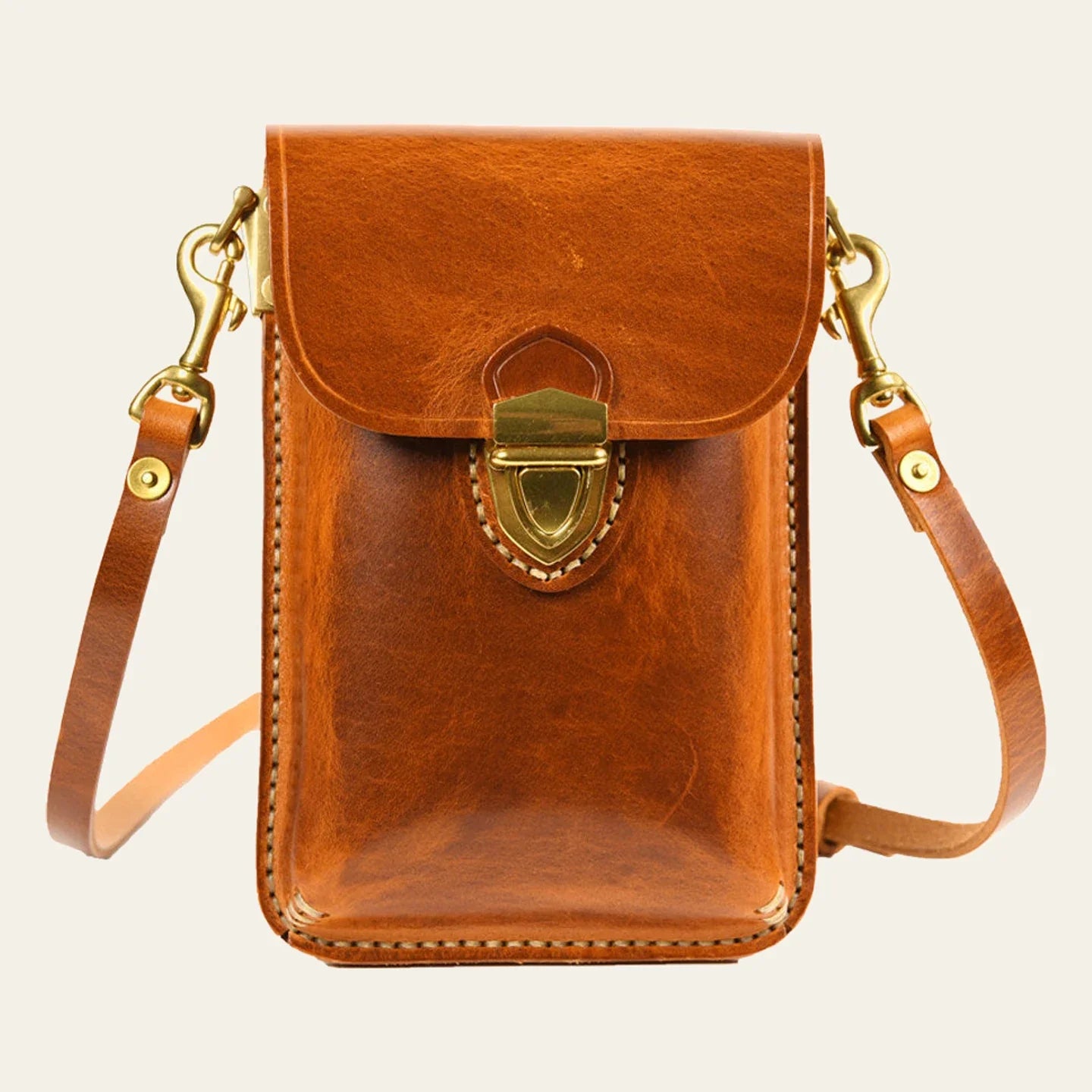 Vintage Brown leather phone bag with flap closure and single strap