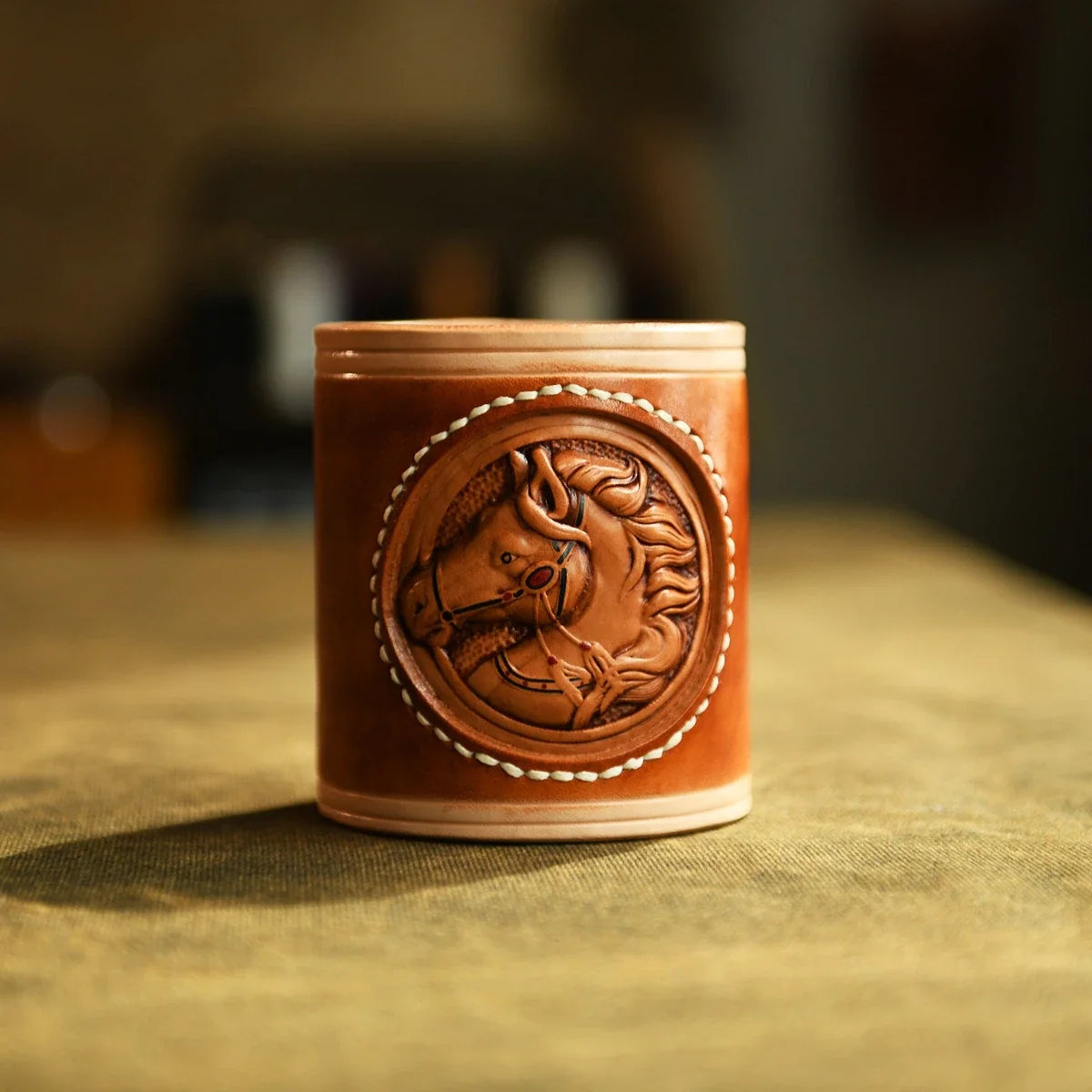 Brown hand-carved leather horse pen holder