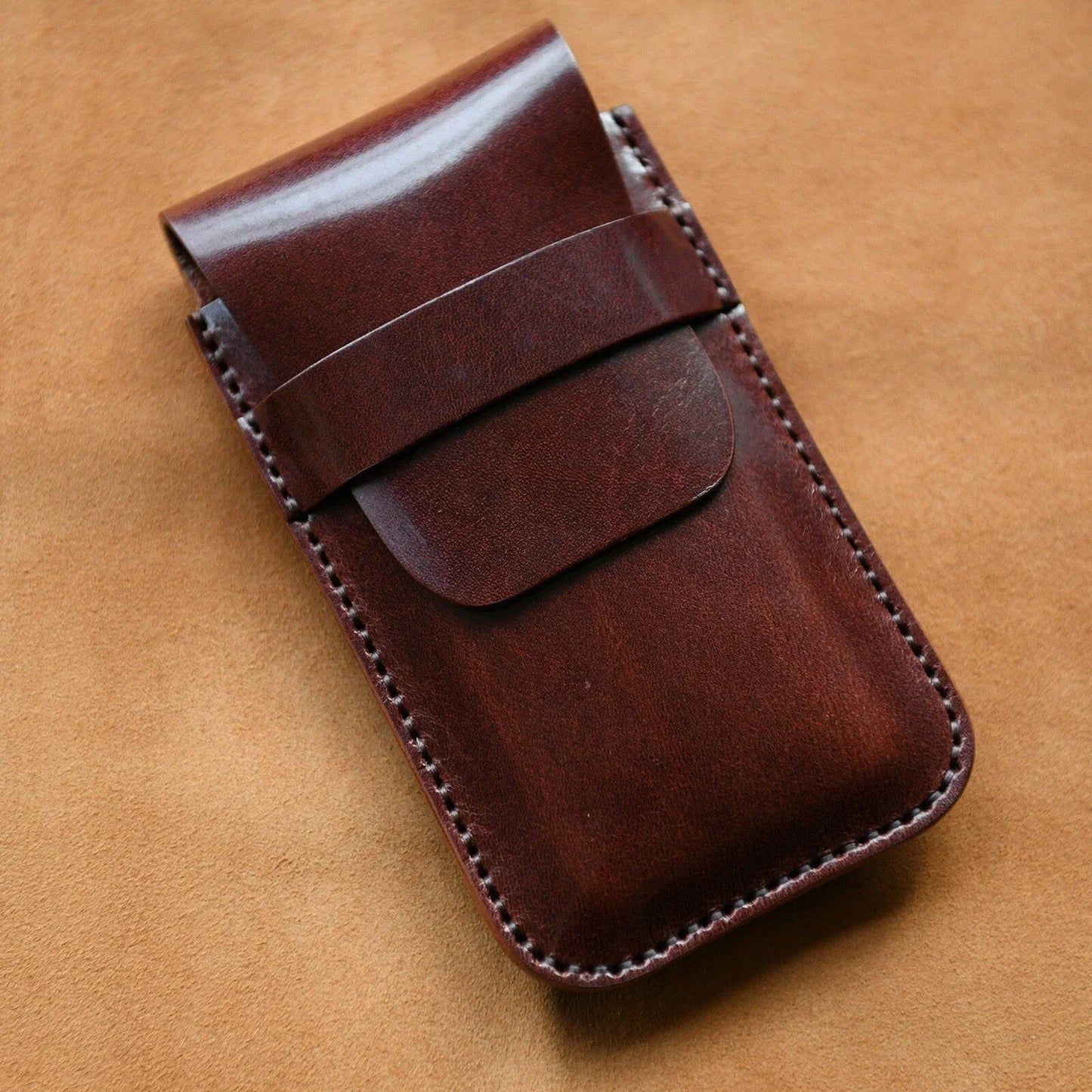 Dark brown hand-stitched leather watch pouch