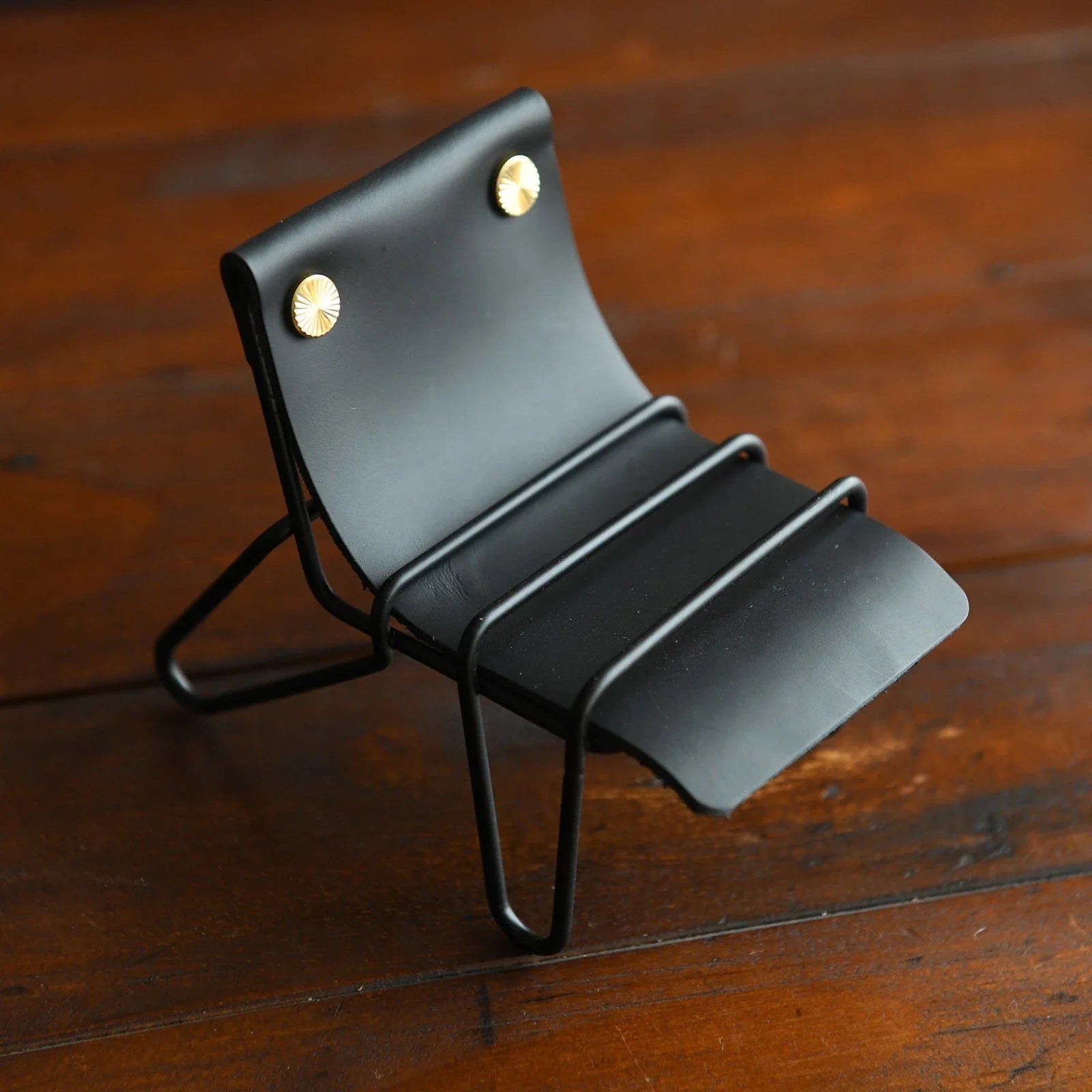 Black leather phone stand with black frame