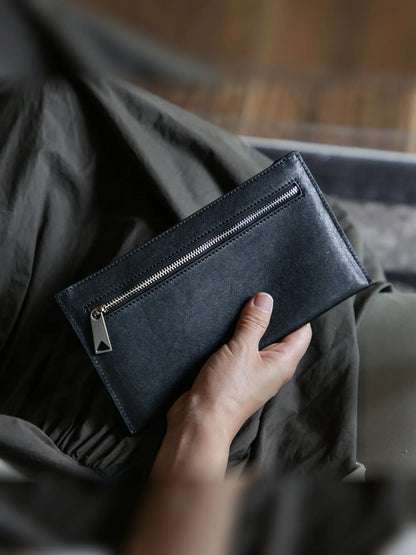 Black vegetable-tanned leather slim long wallet with exterior zip pocket