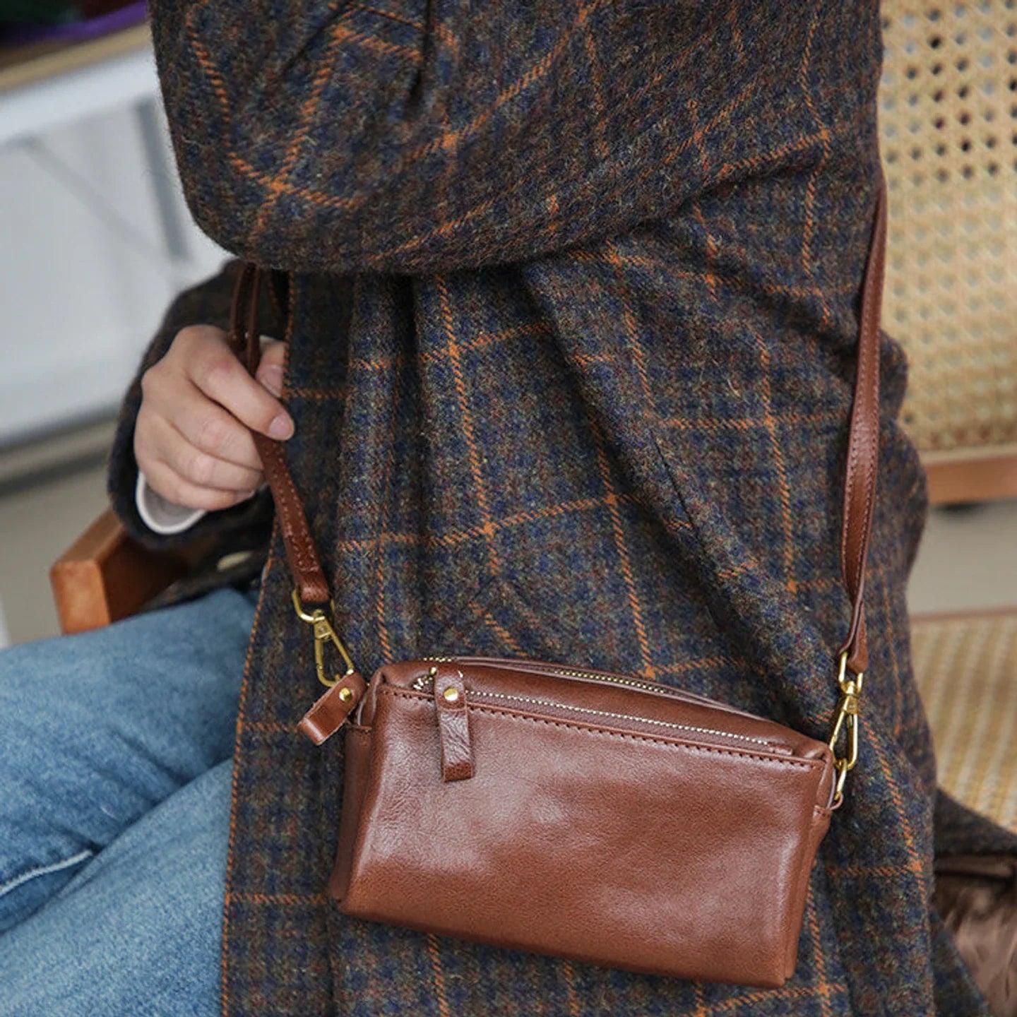 Coffee brown leather crossbody bag styled for everyday wear