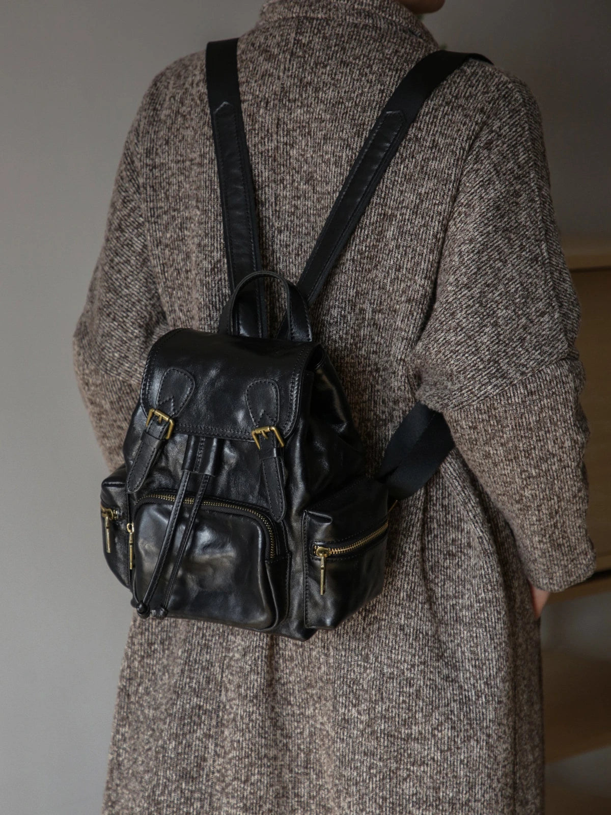 Black leather backpack alternate on-body view