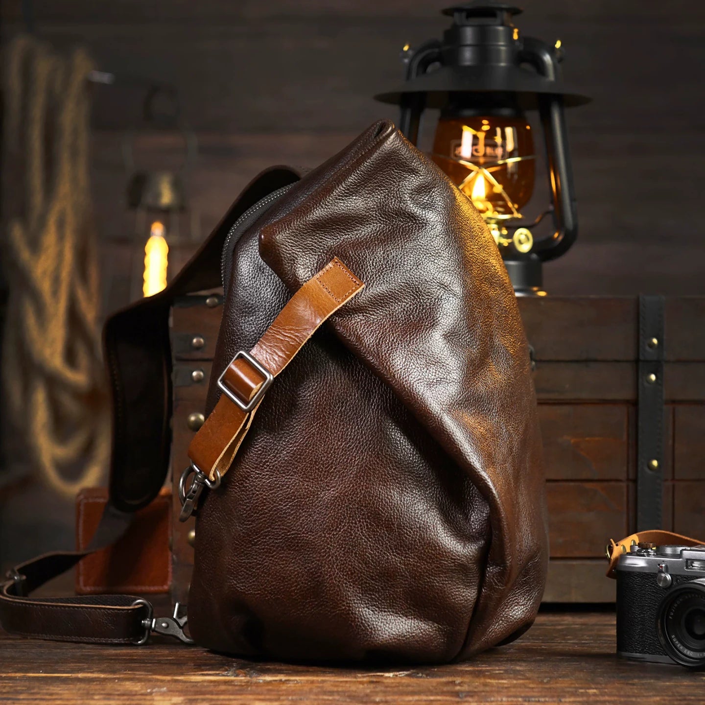 Vintage Coffee cowhide leather sling chest bag, studio product view