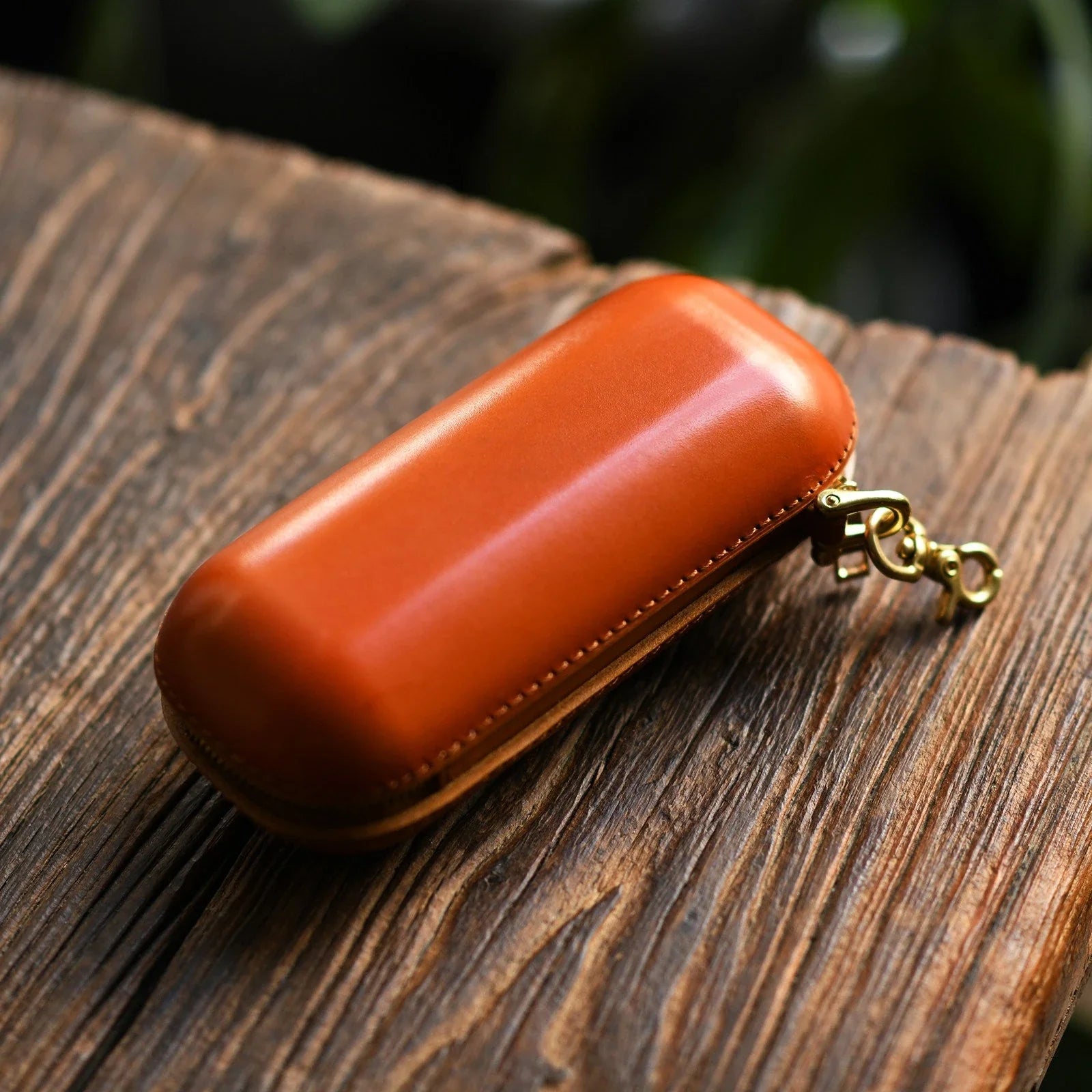 Small tan vegetable-tanned leather eyeglass case