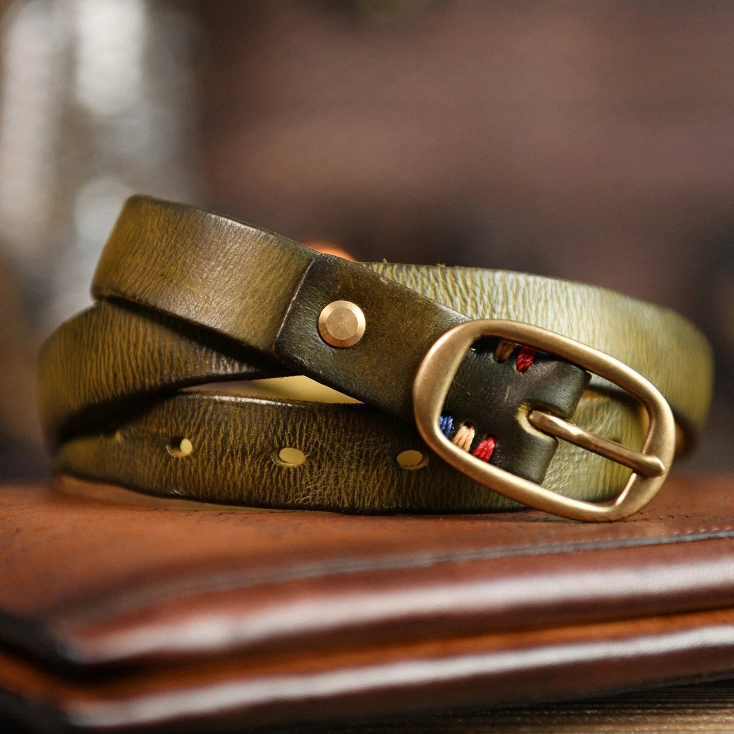 Women's distressed cowhide belt in olive green