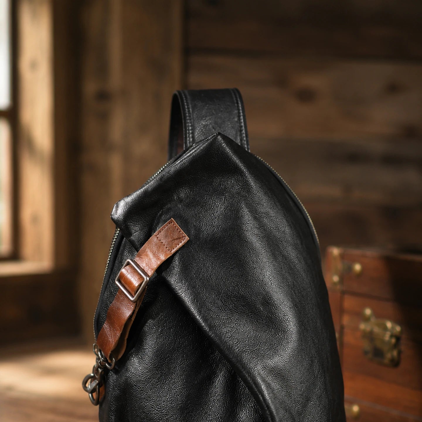 Black first-layer cowhide leather sling chest bag, full view