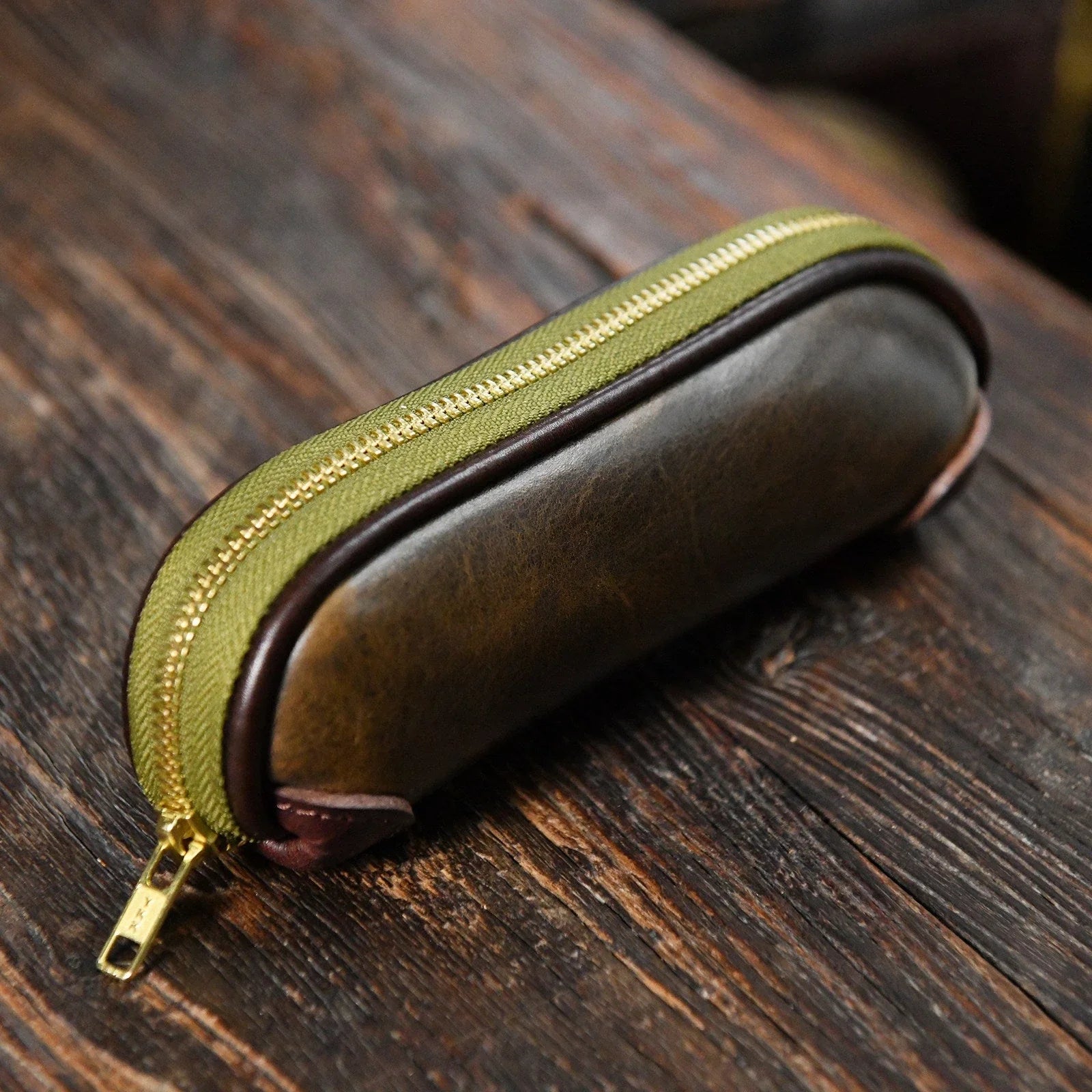 Forest green vegetable-tanned leather zipper pencil case
