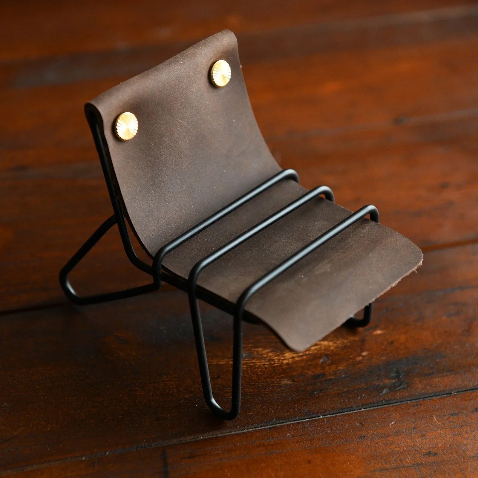 Coffee brown leather phone stand with black frame