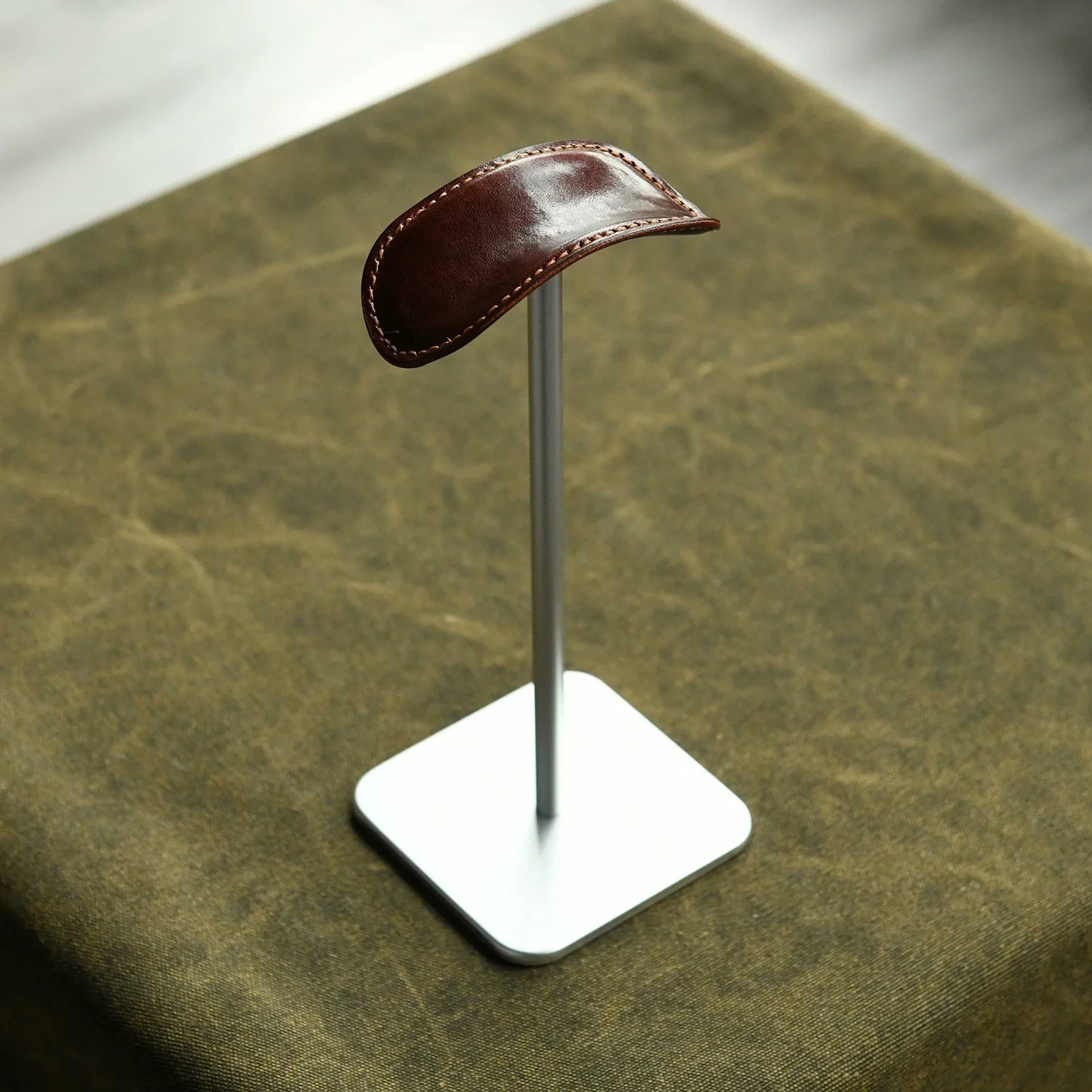 Espresso cowhide and silver metal headphone stand