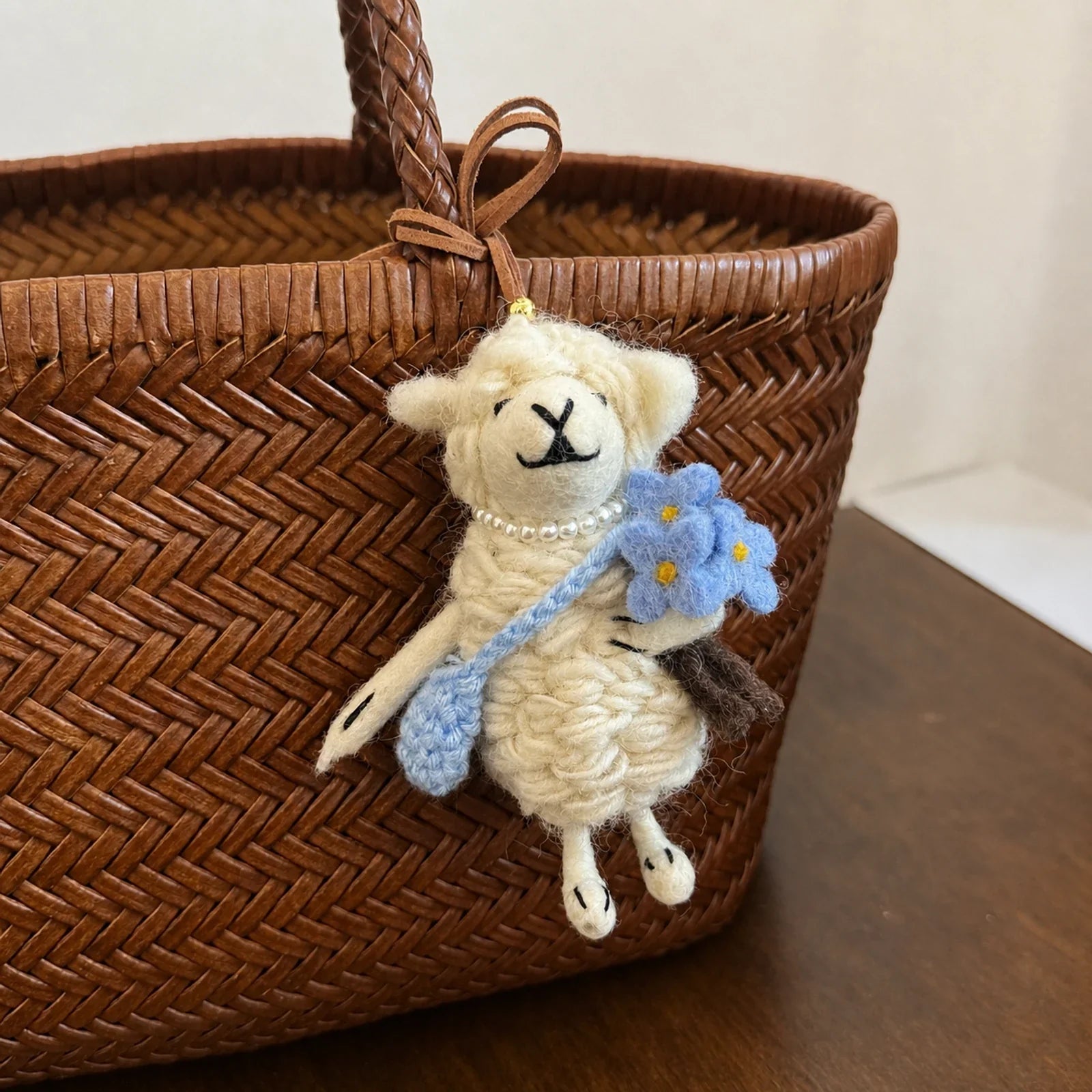 Handmade wool felt sheep bag charm – blue flower white sheep