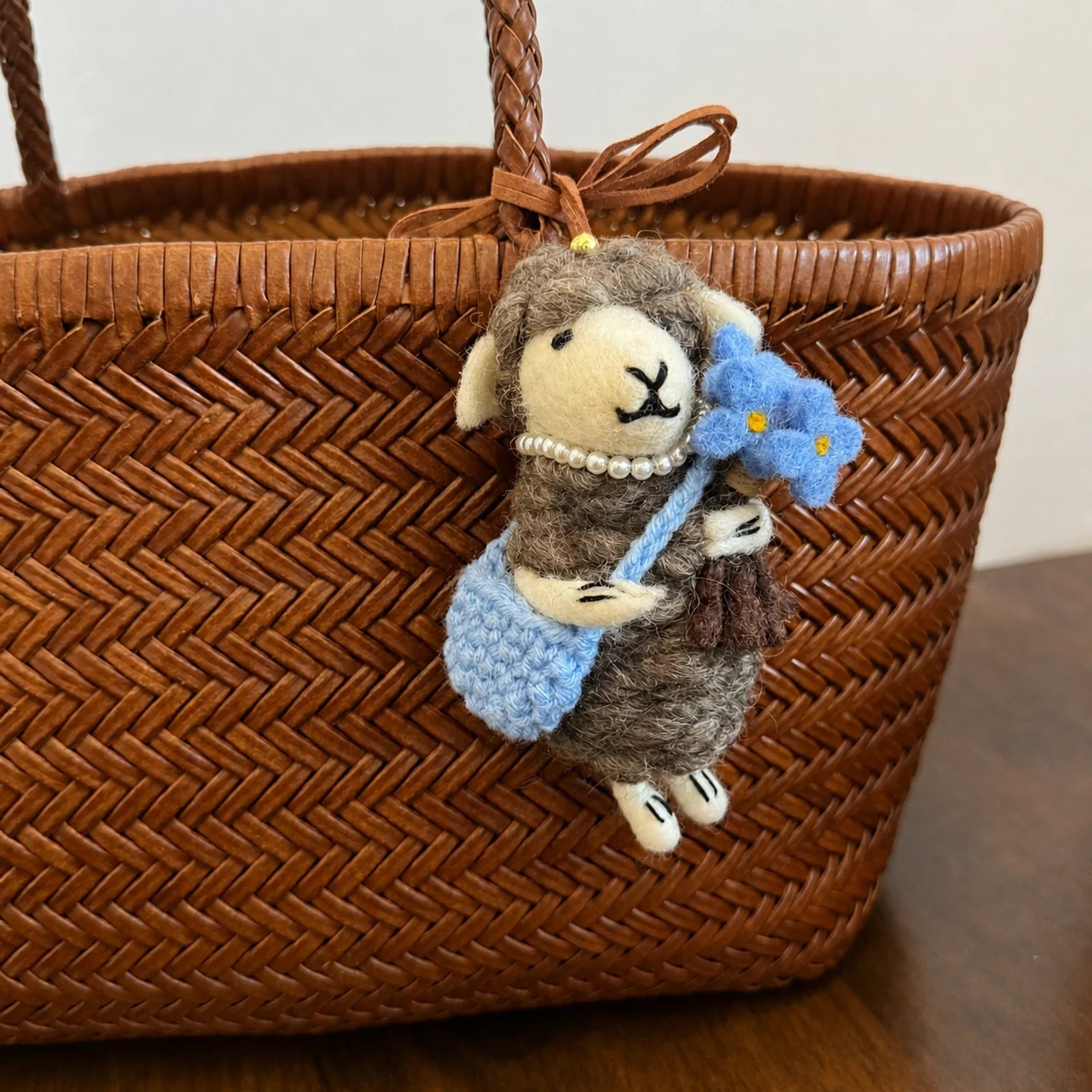 Handmade wool felt sheep bag charm – blue flower gray sheep