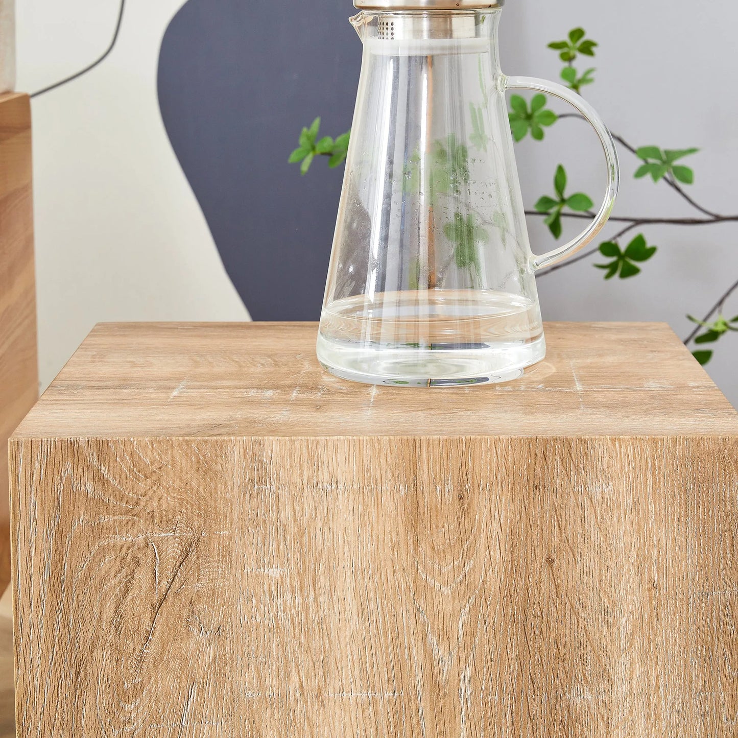 Elevate your living space with this square modern MDF coffee table that showcases smooth, light wood color texture patterns. It is characterized by – view 18