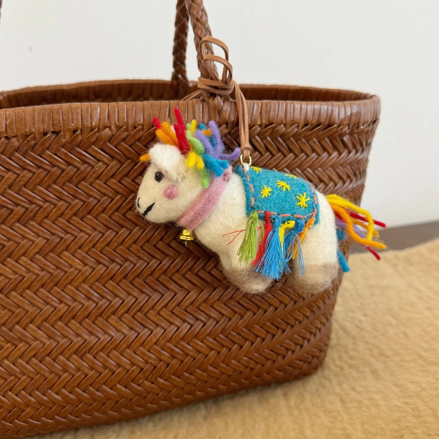 Wool felt horse charm with colorful tassels