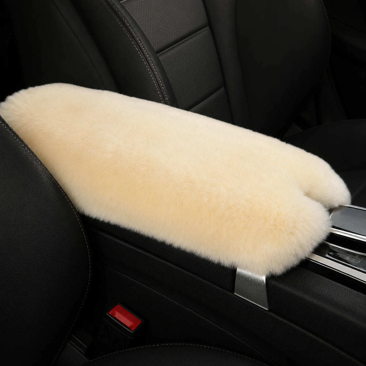 Cream beige genuine Rex rabbit fur center console armrest pad installed in a black car interior