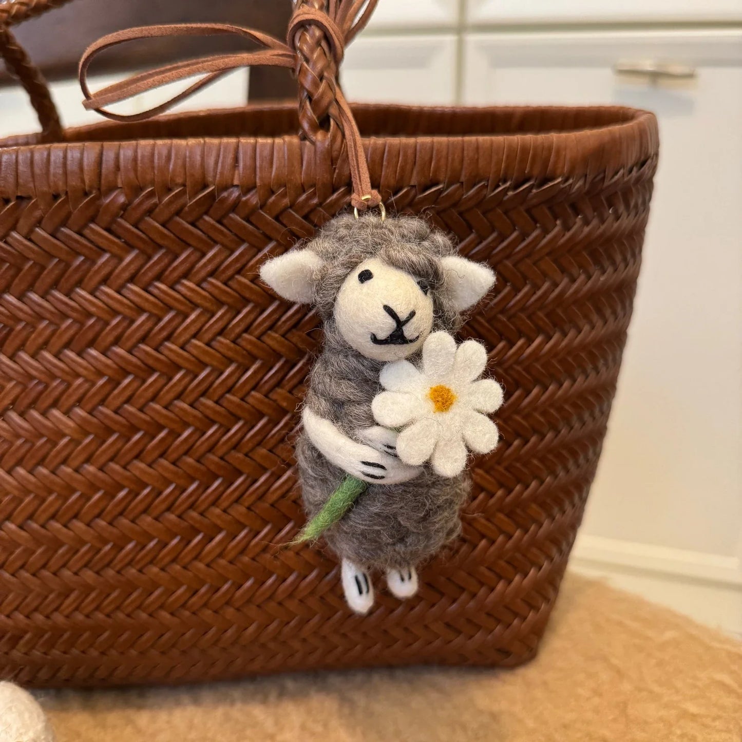 Handmade wool felt sheep bag charm – gray sheep with white flower