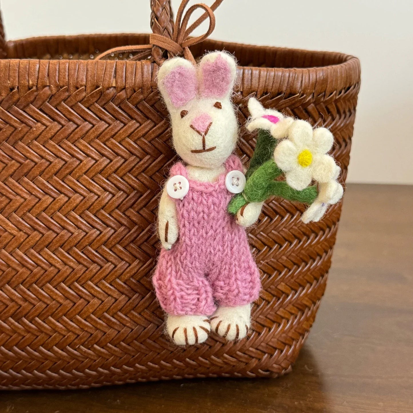Pink rabbit with white flower wool felt charm