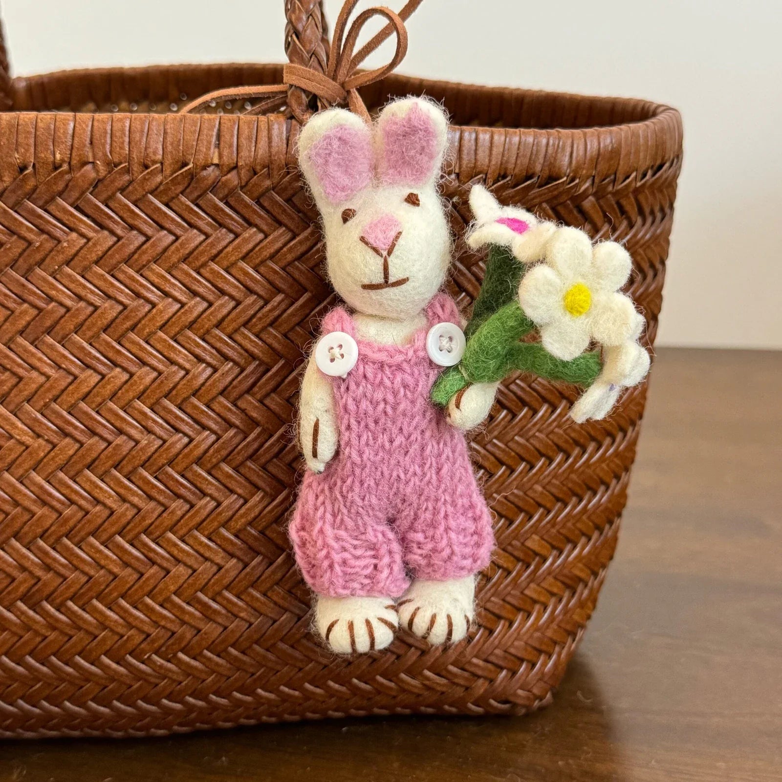 Pink rabbit with white flower wool felt charm