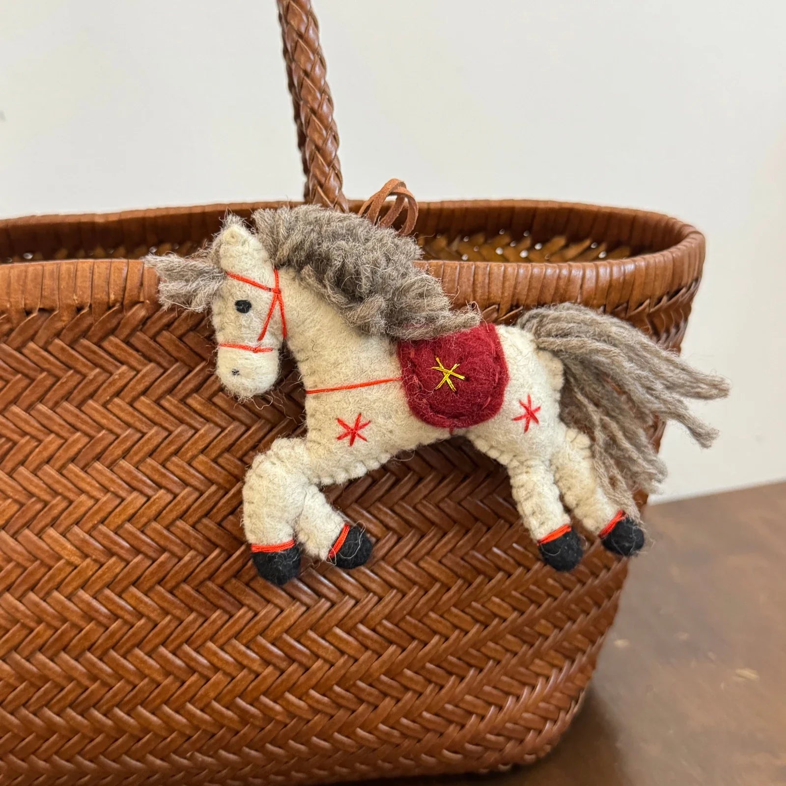 Gray wool felt horse charm with star detail