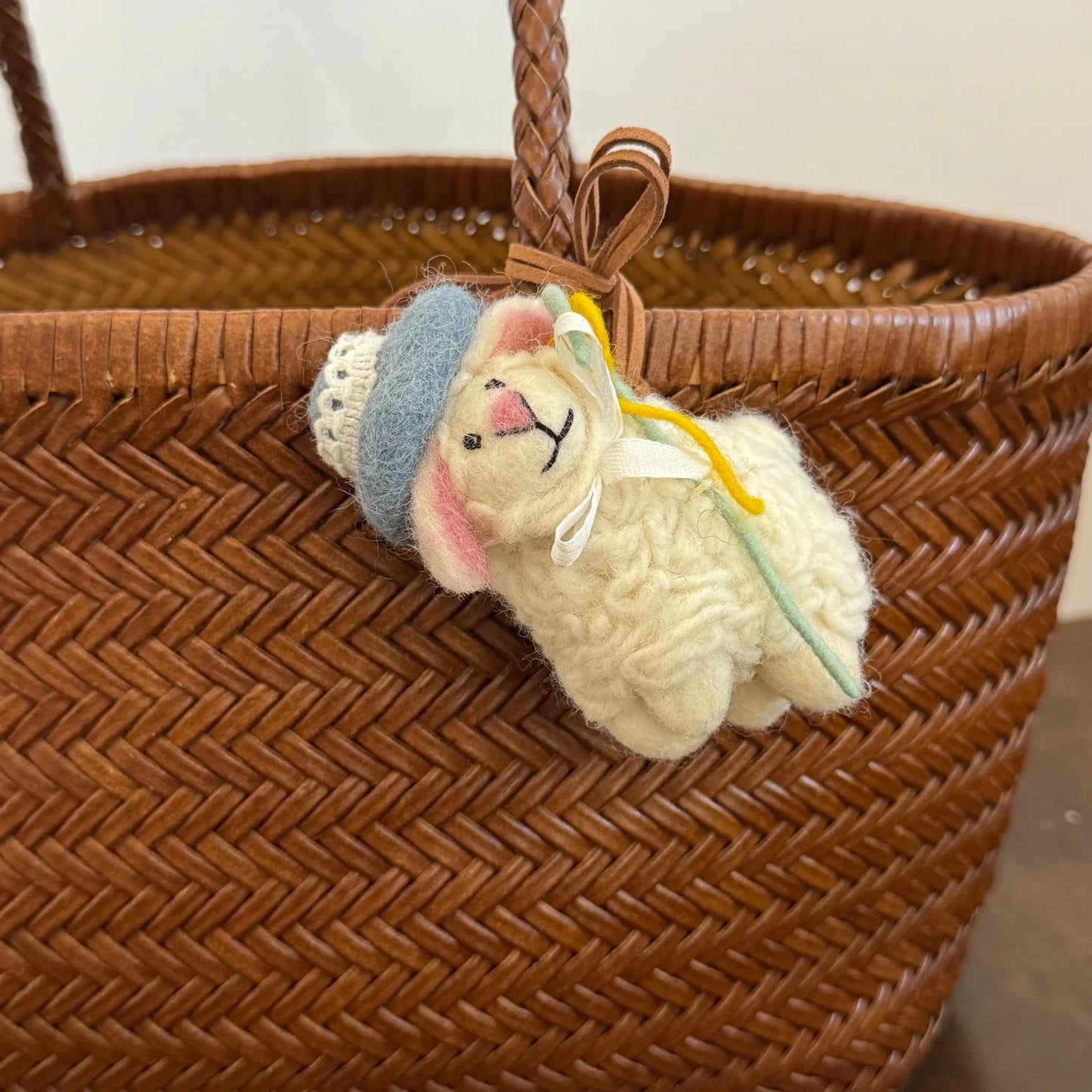 Handmade wool felt sheep bag charm – playful tilted head sheep