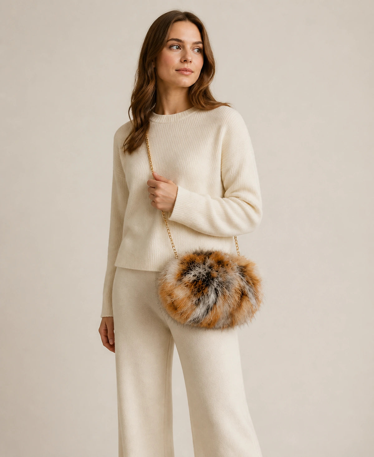 Women's Genuine Red Fox Fur Hand Muff Chain Bag – Style: Hand Muff Chain Bag | Color: Natural Red Fox on-model lifestyle image