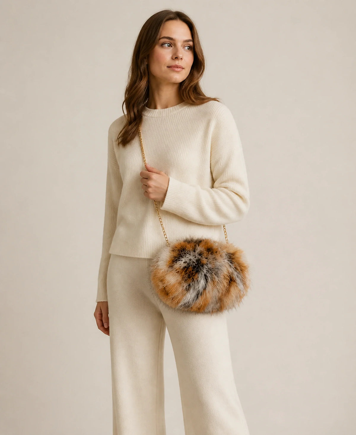 Women's Genuine Red Fox Fur Hand Muff Chain Bag – Style: Hand Muff Chain Bag | Color: Natural Red Fox on-model lifestyle image