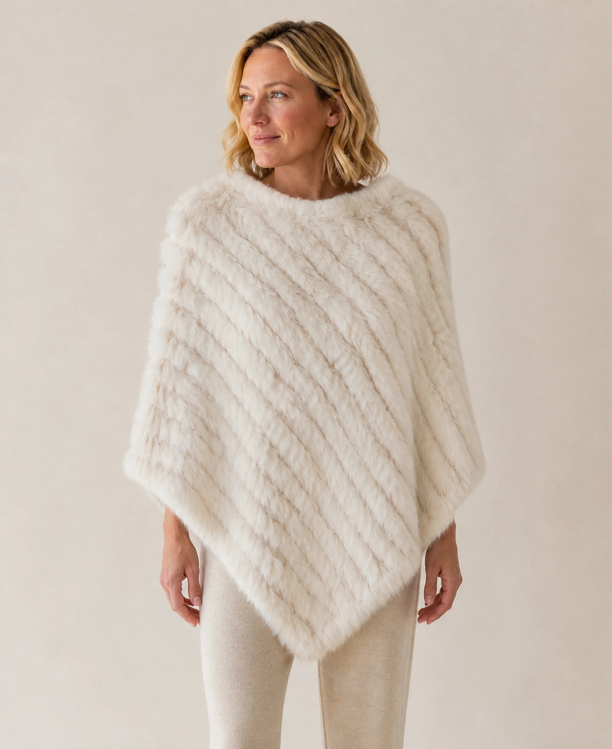 Handwoven Genuine Rabbit Fur Triangle Poncho – Collar Style: Classic Knit Collar | Color: Creamy White on-model lifestyle image