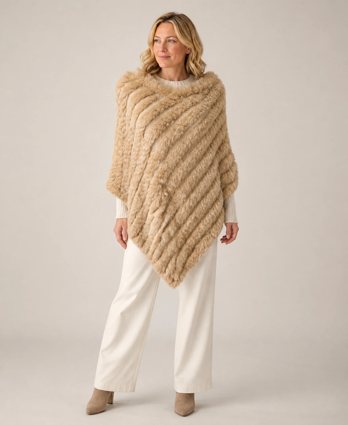 Handwoven Genuine Rabbit Fur Triangle Poncho – Collar Style: Raccoon Fur Collar | Color: Beige on-model lifestyle image