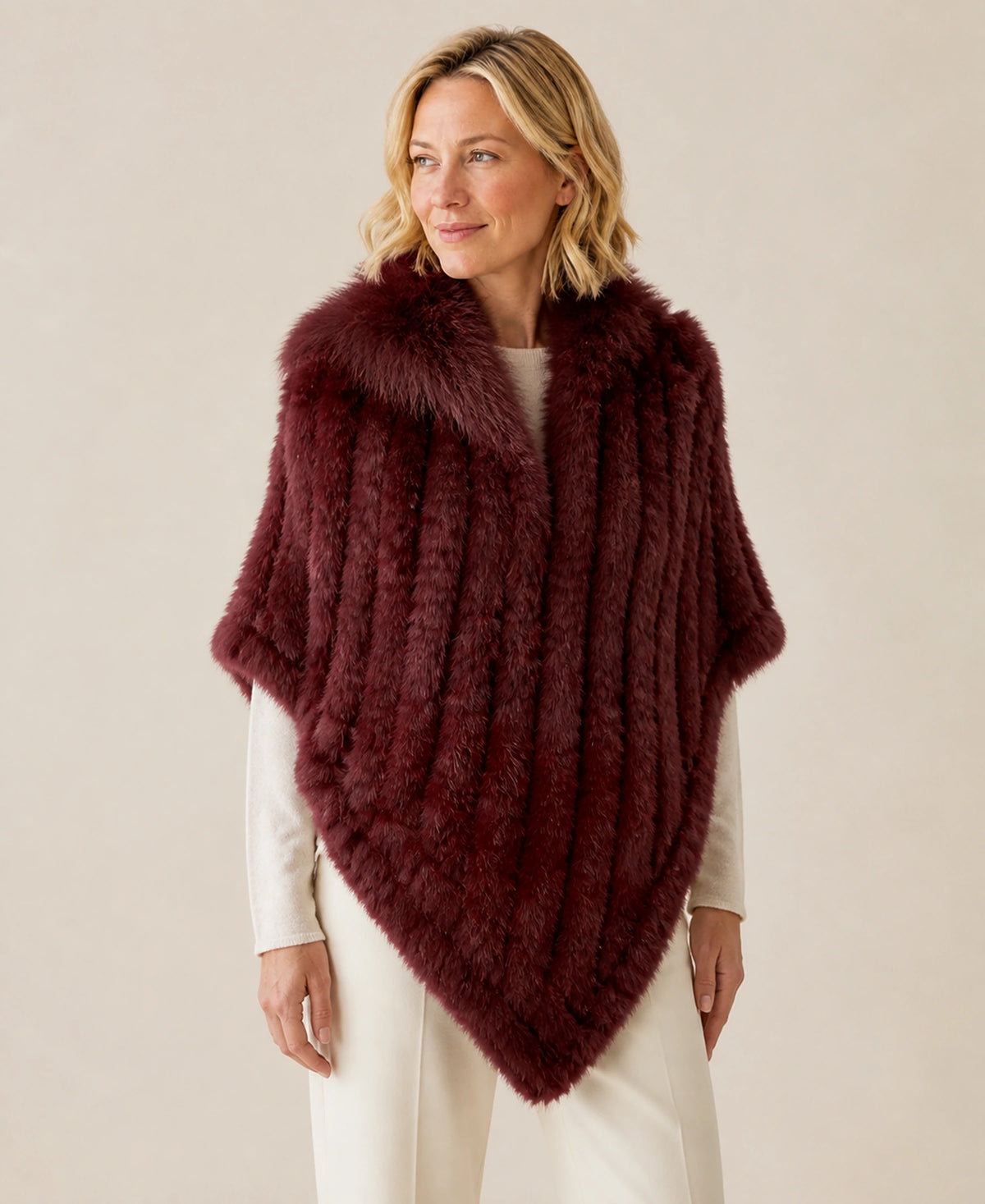 Handwoven Genuine Rabbit Fur Triangle Poncho – Collar Style: Raccoon Fur Collar | Color: Burgundy on-model lifestyle image