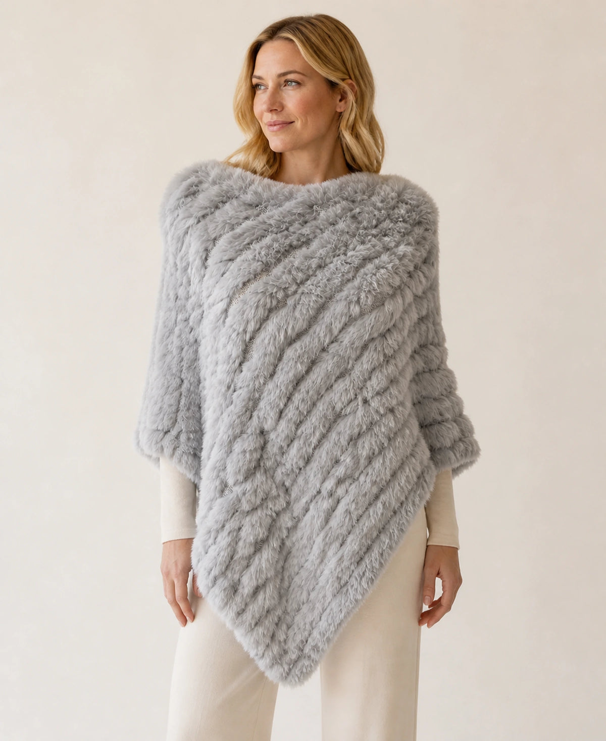 Handwoven Genuine Rabbit Fur Triangle Poncho – Collar Style: Raccoon Fur Collar | Color: Light Gray on-model lifestyle image