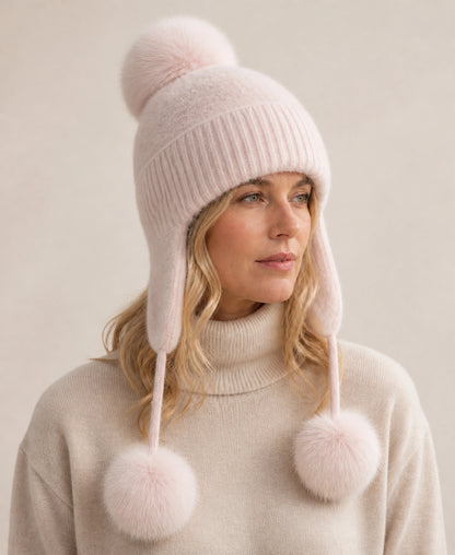 Women's Fox Fur Pom-Pom Knit Earflap Trapper Hat – Color: Rose Pink on-model lifestyle image